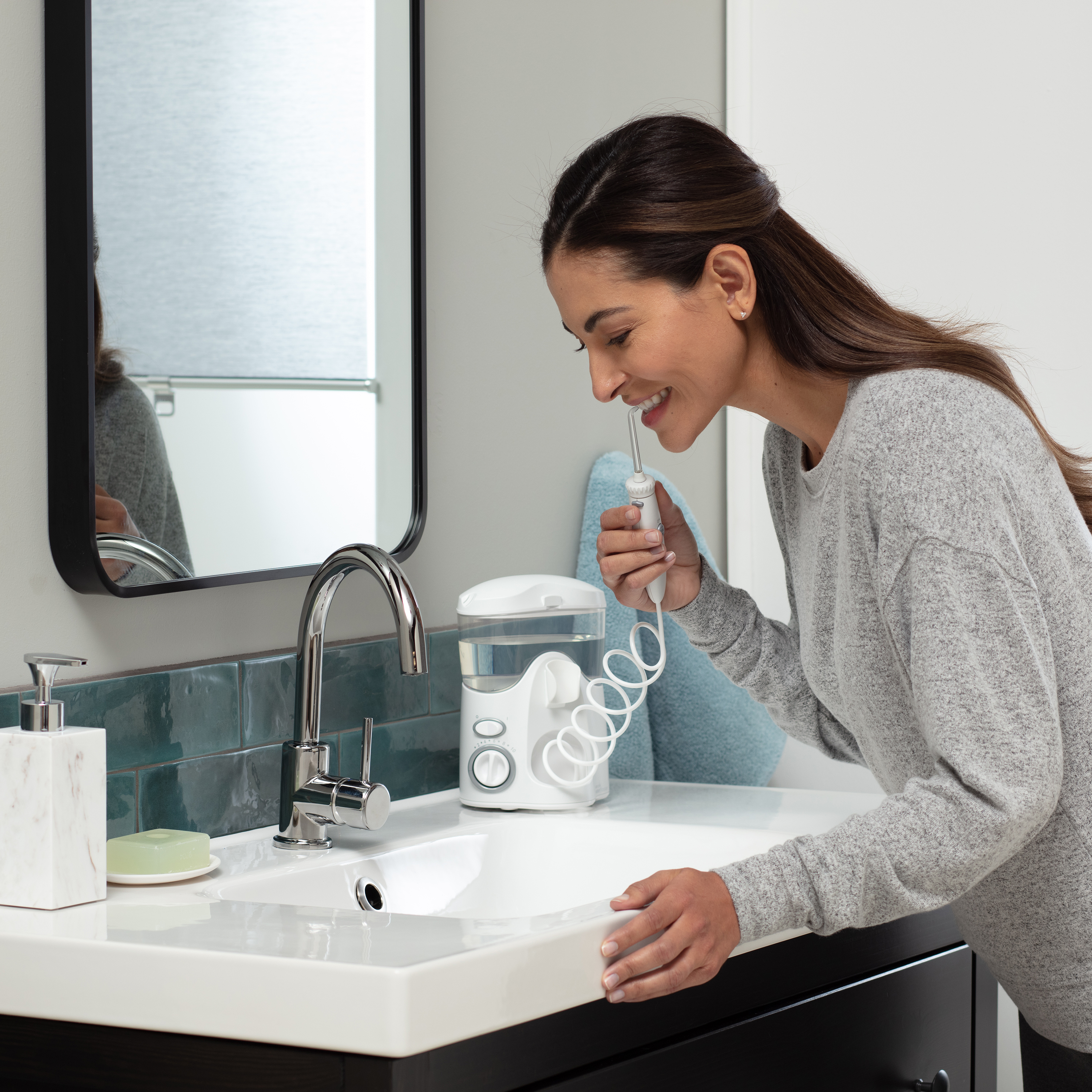 Die Waterpik™ Munddusche – einfach und effektiv